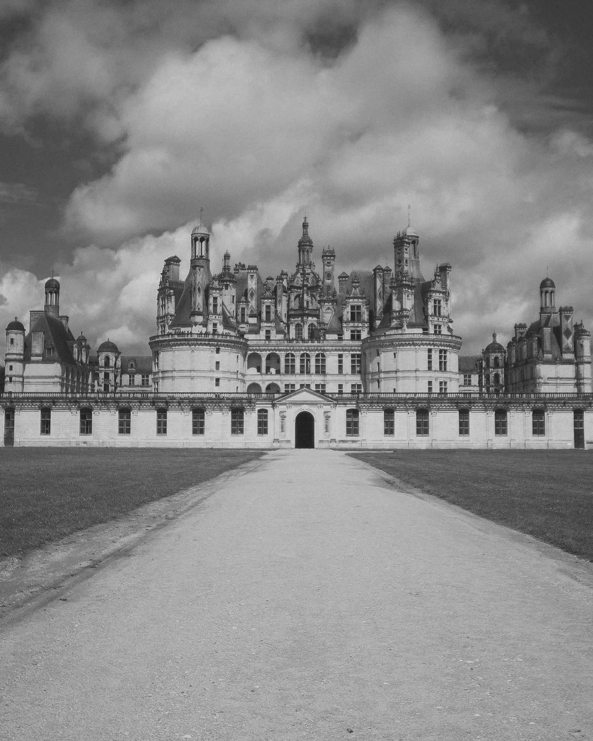 Grand château at the end of a long formal driveway