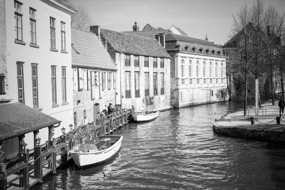 Historic canal-side buildings photographed from the water