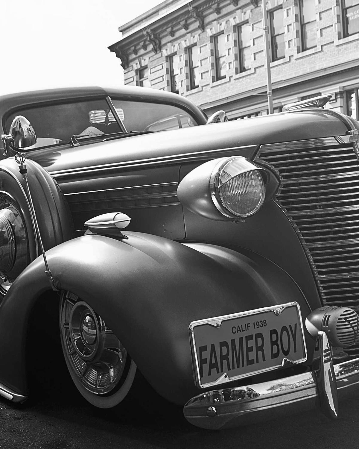 Front grille of a vintage car photographed on the street