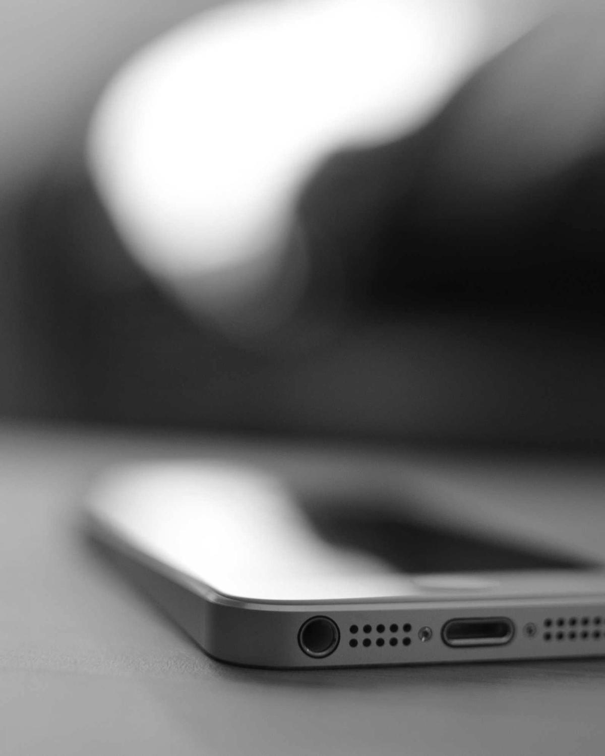 Macro photograph of a smartphone edge and speaker detail